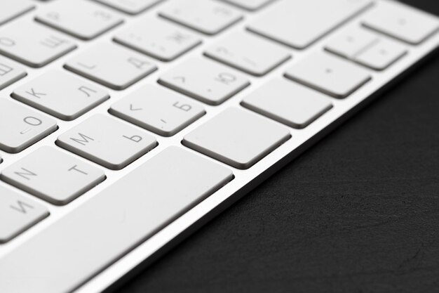 Office table with keyboard isolated on black background