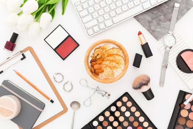 Office tools and breakfast on desk