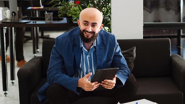 Free photo office worker reading annual reports