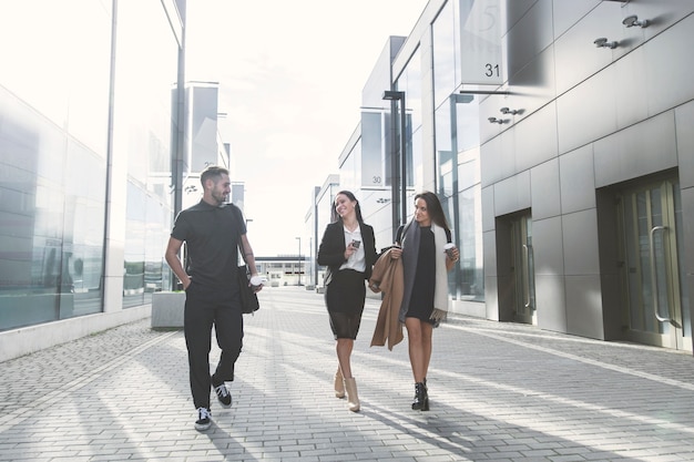 Office workers walking on street