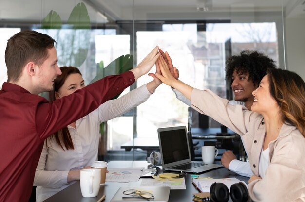 Office workers working together as a team