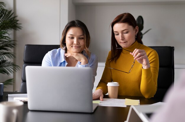 Office workers working together as a team