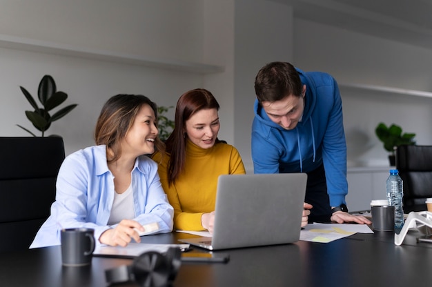 Office workers working together as a team