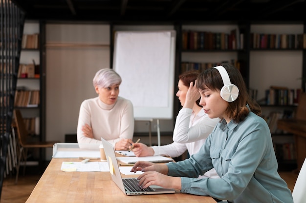 Office workers working together as a team