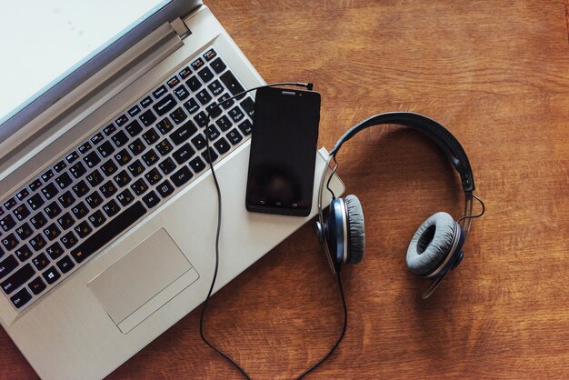 Office workplace with a laptop and  smartphone