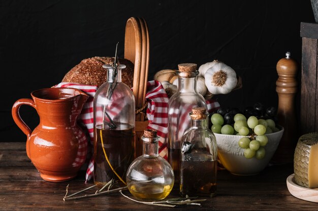 Oils and jug near food