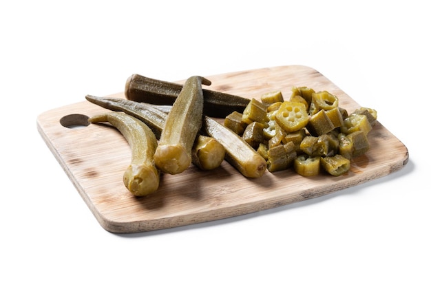 Free photo okra slices on wooden table