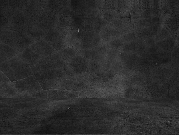 Old black background. Grunge texture. Dark wallpaper. Blackboard Chalkboard Concrete.