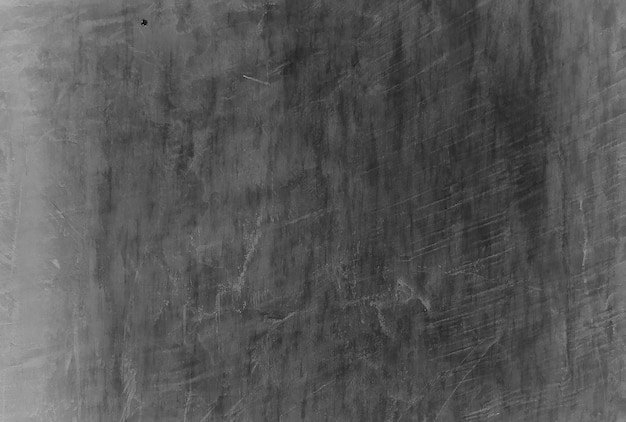 Old black background. Grunge texture. Dark wallpaper. Blackboard Chalkboard Concrete