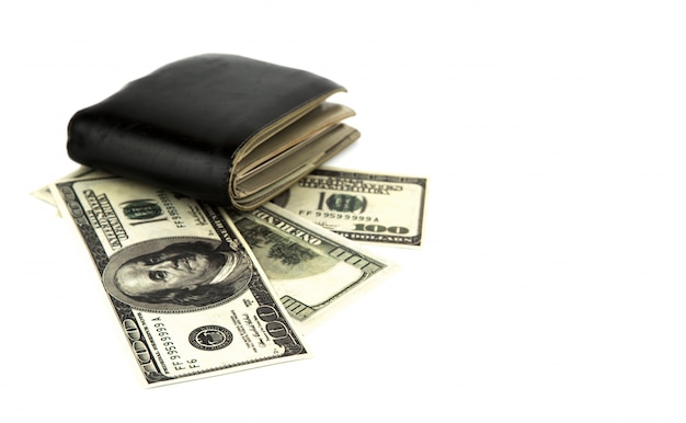 Old black wallet with dollar  isolated on white background