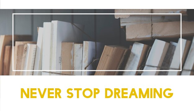 Old books on a shelf background with never stop dreaming quote