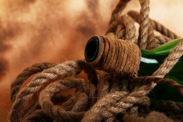 Old bottle and rope