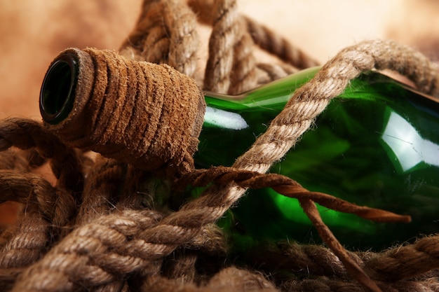 Old bottle and rope