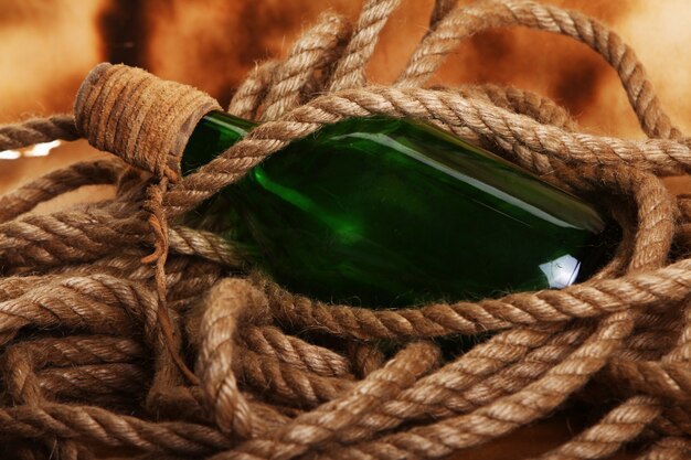 Old bottle and rope