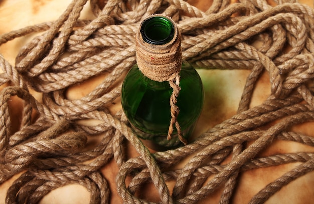 Old bottle and rope