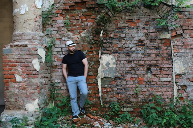 Old brick wall man stand