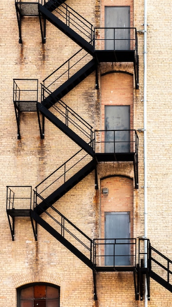 Free photo old building with fire ladder