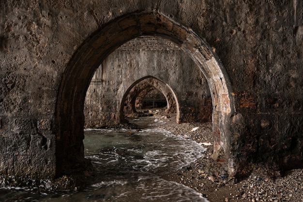 Old city aquatic tunnels on coast line Alanya