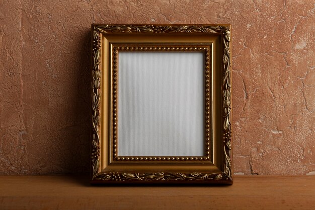 Old empty frame with stucco background