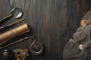 Free photo old fashioned flat lay with letters writing accessories on dark wooden table