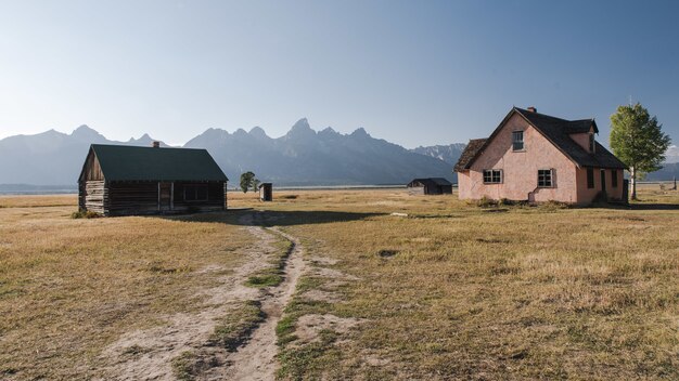 Old houses in the rural area with mountains on the surface