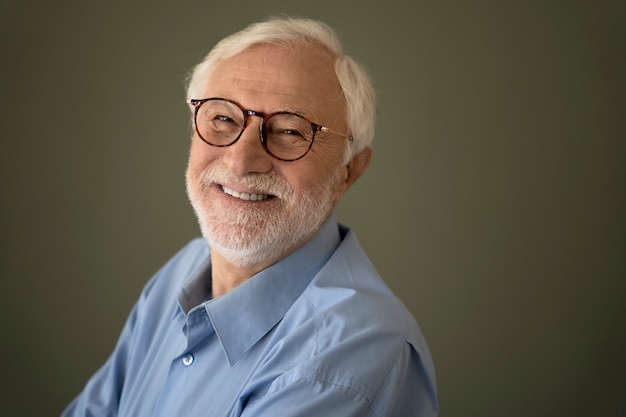 Free photo old man posing indoors medium shot