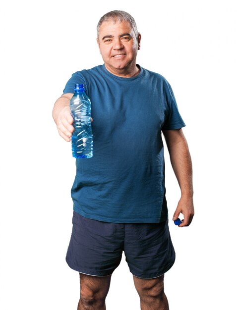 Old man with a bottle of water