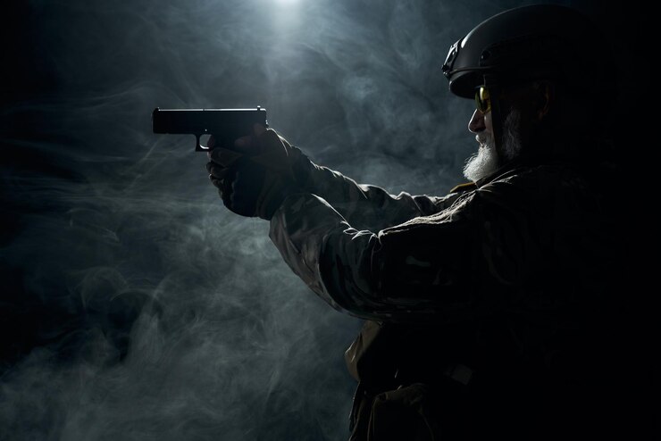 Free Photo old military officer pointing with gun
