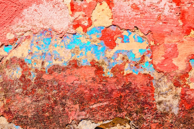 Free photo old paint peeling from wall texture background