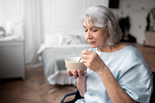 Old patient suffering from parkinson