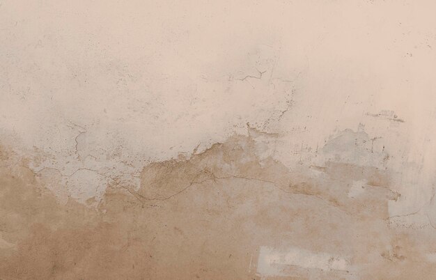 Old peeling cream-colored wall texture