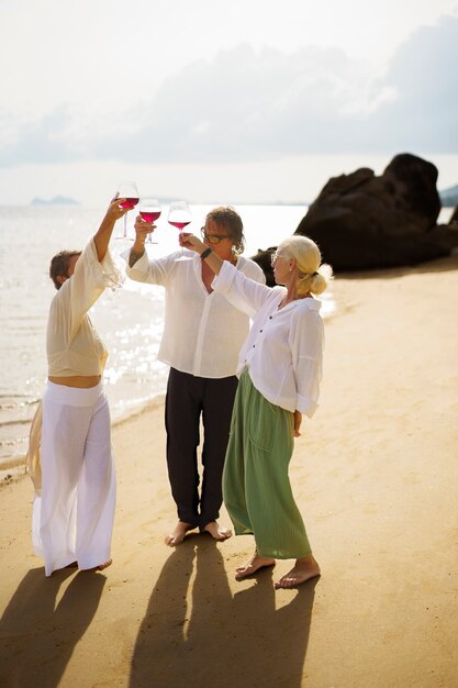 Old people having fun at the beach