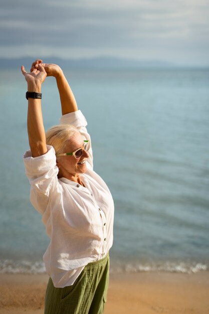 Old people having fun at the beach