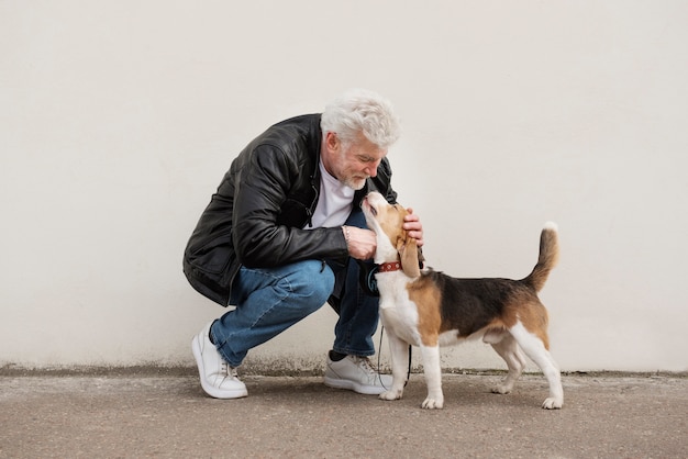 Old person with their pet dog