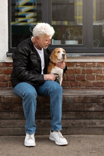 Old person with their pet dog