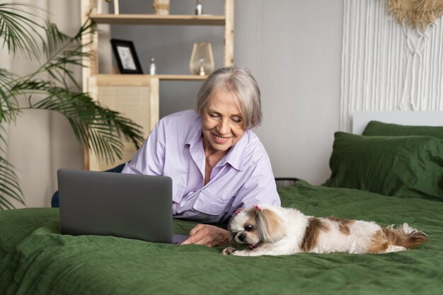 Old person with their pet dog