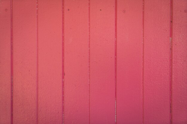 Old pink wood background .