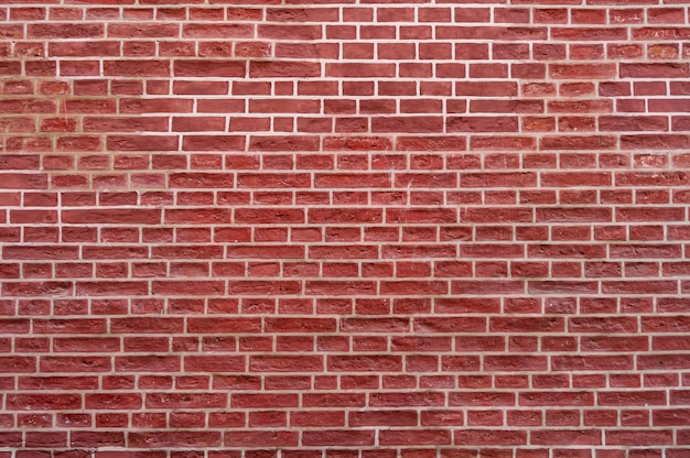 Free photo old red brick wall texture