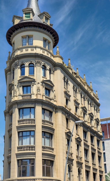Old residential building at sunny day in Barcelona, Spain