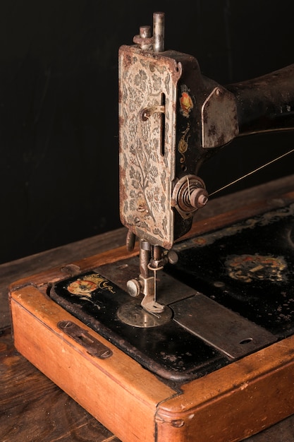 Free photo old sewing machine in workshop