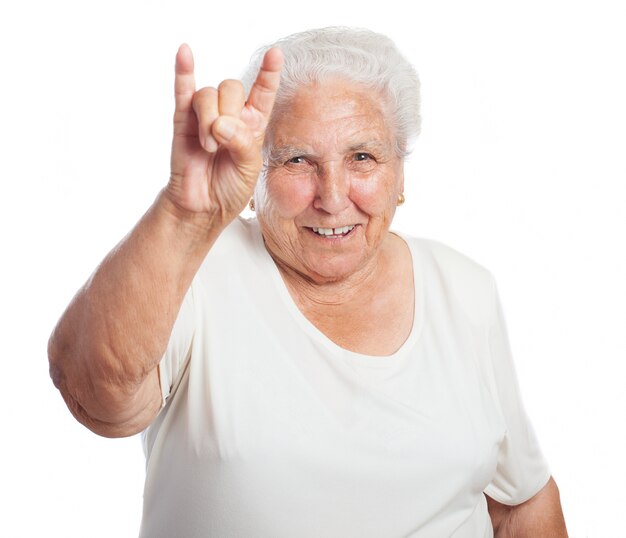 Old woman making horns by hand