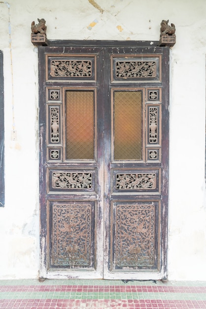 Old wooden brown house door