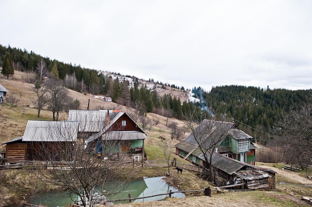 Old wooden vintage and rusty house at Carpathian mountains