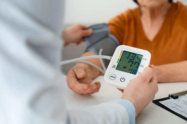 Older person checking their blood pressure with tensiometer