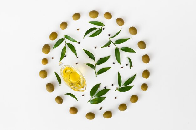 Olive leaves in a circle made of olives