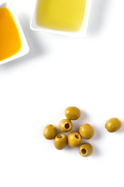 Olive oil in bowl and olives