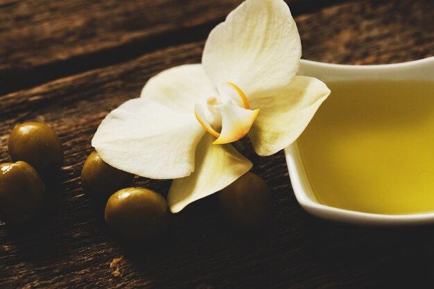 Olive oil with flowers