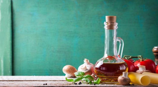 Olive oil with fresh tomatoes and mushrooms