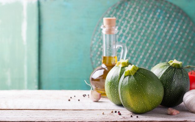 Olive oil with three zucchinis