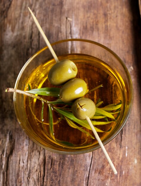 Olives in a plate with olive oil